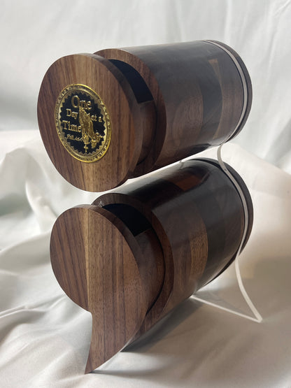 A black walnut semicolon keepsake box with a gold and black "One Day at a Time" coin embedded on the top.