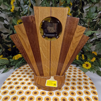 Wooden clock with a circular design on a tablecloth with sunflower pattern