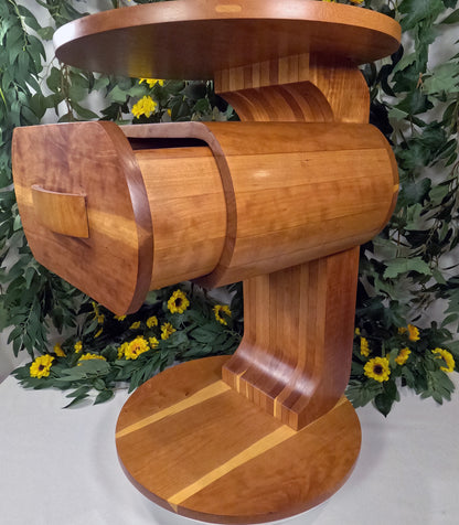 Wooden pedestal table with decorative background