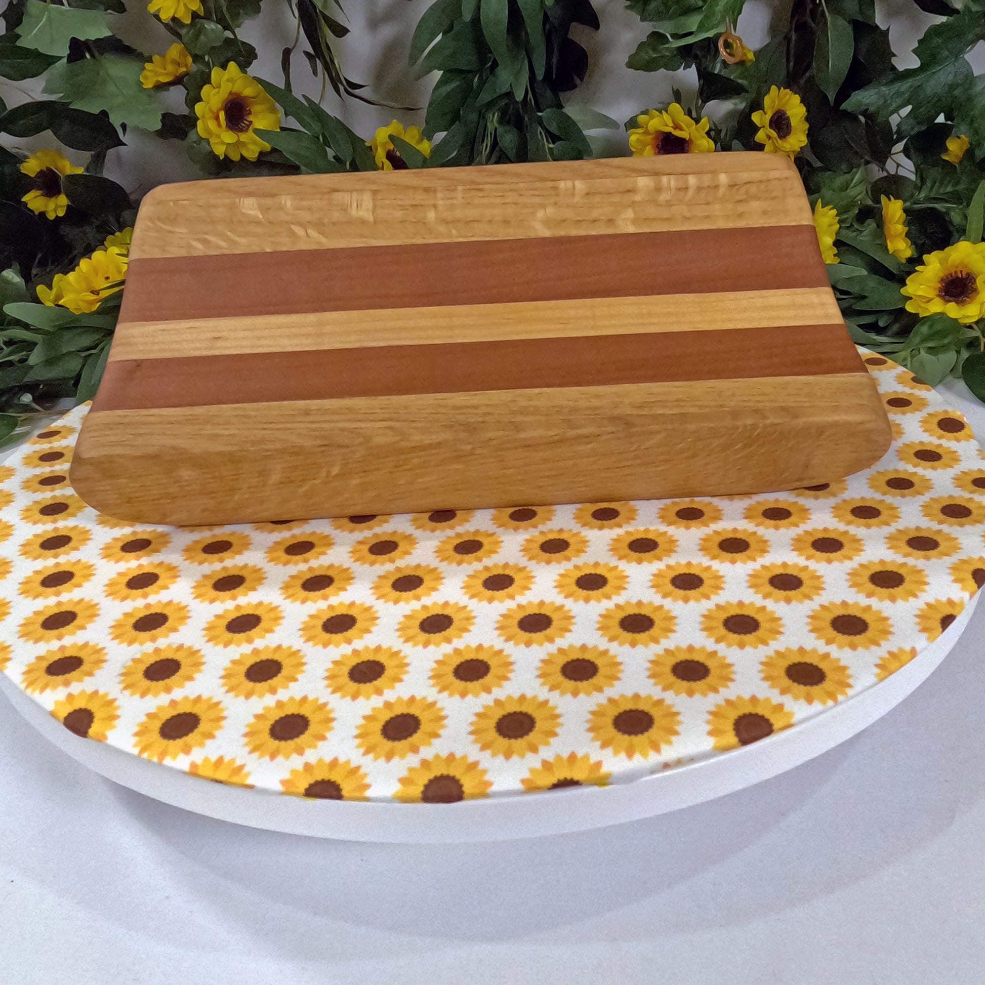 Woodentray on a tablecloth with sunflower pattern