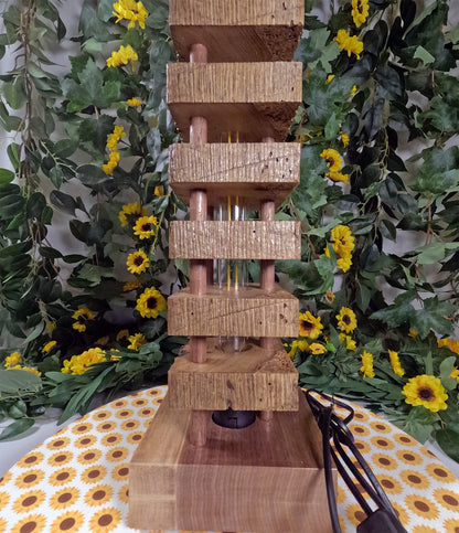 Wooden tiered light with a floral and tablecloth background