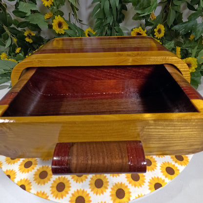 Wooden box with a floral and sunflower patterned surface underneath