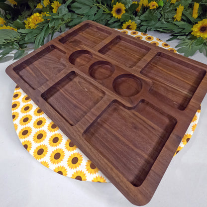 Wooden tray with compartments on a sunflower-patterned mat