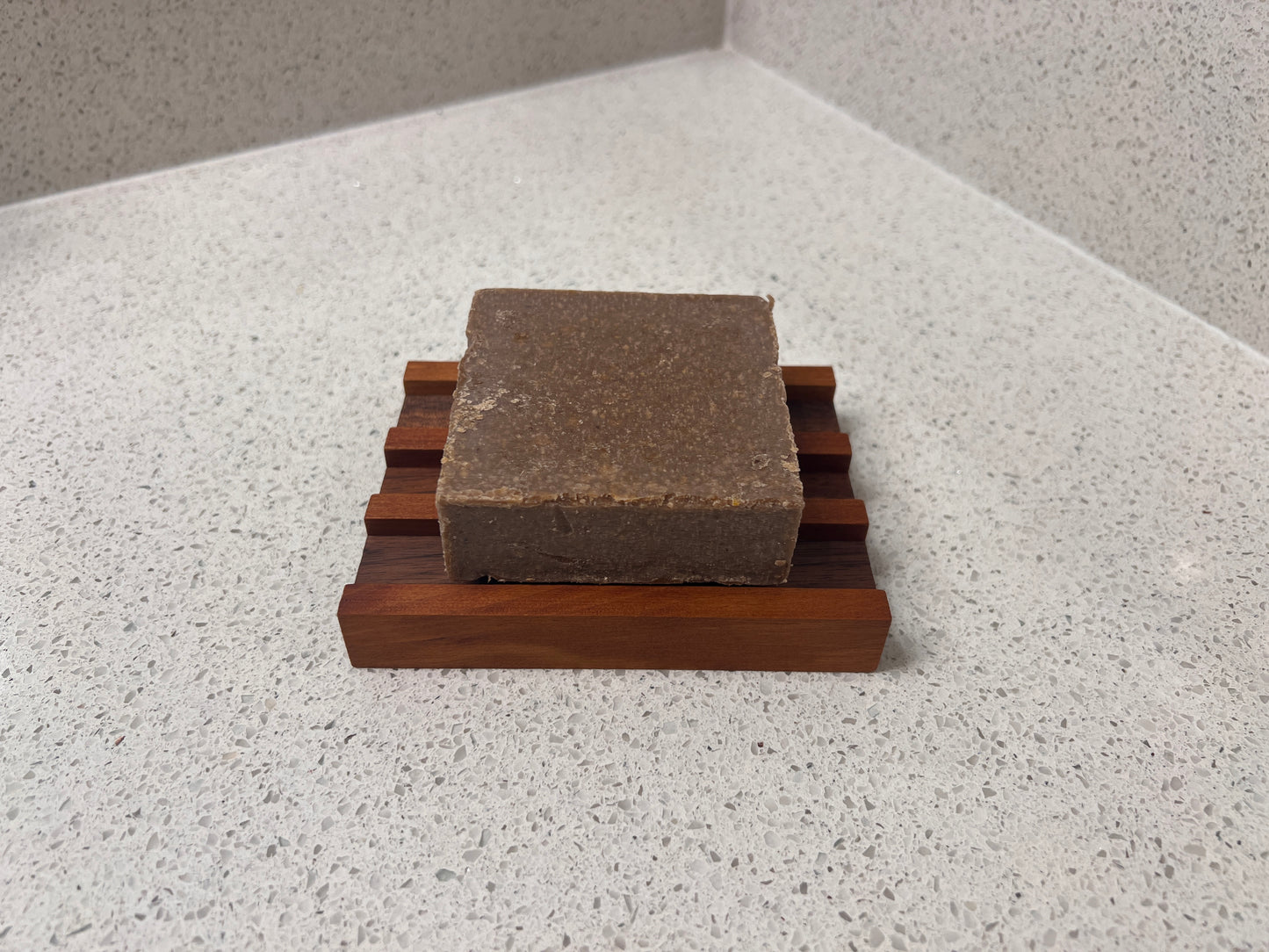 Soap HOLDERZ! soap dish holding a bar of soap raised above the drainage rails