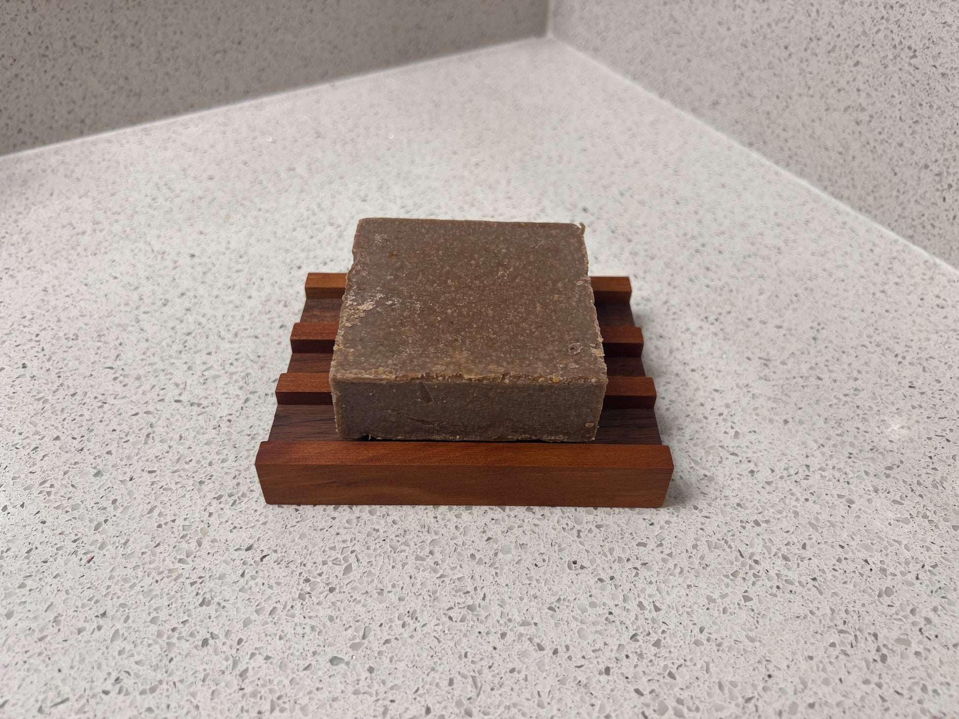 Soap HOLDERZ! soap dish holding a bar of soap raised above the drainage rails