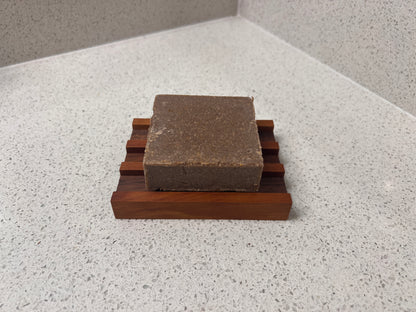 Soap HOLDERZ! soap dish holding a bar of soap raised above the drainage rails