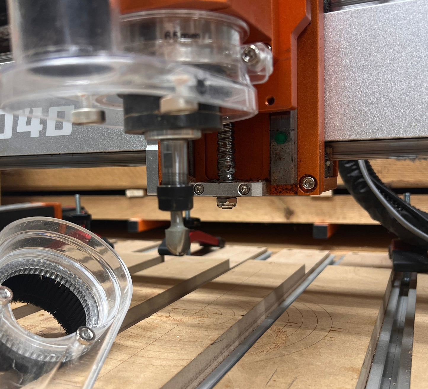 CNC router cutting a cove profile with Vermont cove bit
